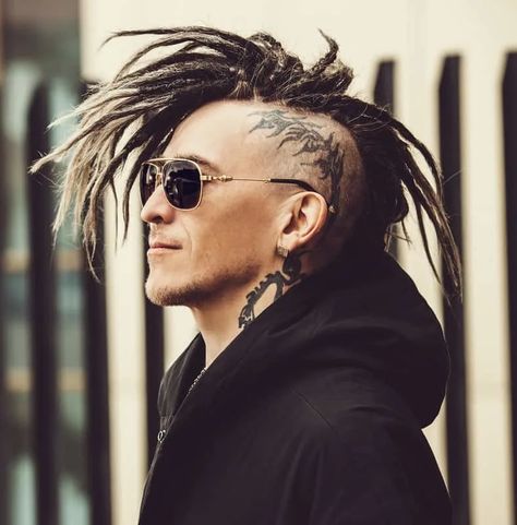 35 Best Punk Hairstyles For Guys to Turn Heads in 2024 Dreadlock Styles, Dreadlocks, Punk, Mens Dreads, Dreadlocks Men, Dreadlock Hairstyles For Men, Dreadlock Mohawk, Dreads With Undercut, Mohawk Dreads