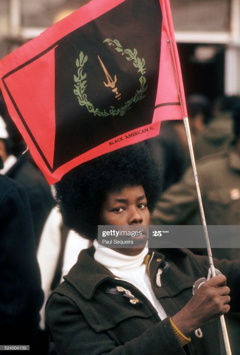 News Photo : Outside the Rayner Funeral Home, a woman holds a... Black Power, American Heritage, Fred Hampton, American Fl, American, Black American Flag, Black Panthers Movement, African American Flag, Black History