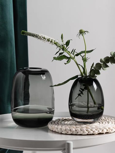 Unique Hand Blown Vase for Modern Home Decor Rounded curvature and dark clear glass finish suitable for any modern backdrop. The vase comes in two sizes: Small: 3" x 5.1" & Large: 4"x 6.5" #Gradientglassvase #Vasedecor #Glassvase #Homedecor #Glassplanter #minimalistdecor Décor, Interieur, Vase, Deco, Case, Vases, Black Decor, Stylish Home Decor, Modern