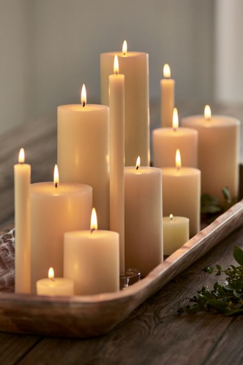 Create captivating atmospheres with Tag's pillar candles, setting the perfect scene in any space. With its versatile size, our signature flat-topped pillar candle is ideal for mixed candle displays or tall hurricanes, bringing warmth throughout the year. Explore a variety of candle sizes and colors from Tag, allowing you to mix and match for a personalized touch. Interior, Decoration, Home Décor, Candle Lit Living Room, Candle Holders Decor Ideas, Candle Pillars Decor, Candle Display Ideas, Pillar Candle Decor, Long Candle Tray