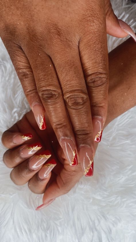 Red coffin nails with a nude base and gold flakes Gold Flake Nails Red, Red Nails With Gold, Red And Gold Nails, Red And White Nails, Red Acrylic Nails, Red Nail Designs, Gold Acrylic Nails, Gold Gel Nails, Gold Nail Designs