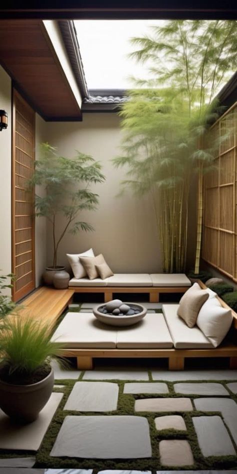 Design a tranquil enclosed patio inspired by Asian Zen gardens, featuring sliding shoji screens, bamboo accents, and a minimalist design. Neutral colors and natural materials like bamboo and stone contribute to a calming atmosphere. Low-profile seating with plush cushions provides comfortable seating, while carefully placed potted plants add a touch of greenery. Patio Design, Gardening, Small Zen Garden Ideas Outdoor, Zen Patio Ideas, Outdoor Zen Space, Indoor Patio, Enclosed Patio, Indoor Zen Garden, Minimalist Outdoor Furniture