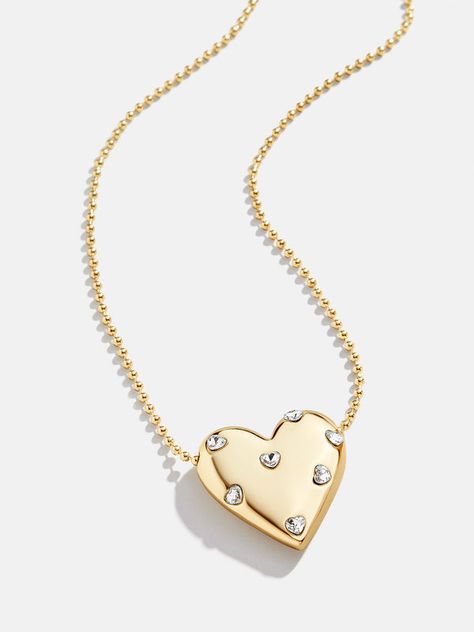 Shop all necklaces at BaubleBar, featuring everyday gold chain necklaces, personalized pendants & statement charm necklaces. Enjoy free UPS shipping over $75 & free returns. Bijoux, Gold Necklace, Gold Medallion Necklace, Gold Chain Necklace, Necklace Designs, Necklace, Chain Pendants, Heart Pendant Necklace, Heart Pendant Gold