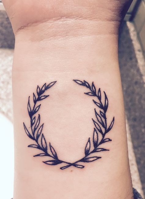 Olive wreath inner wrist tattoo. Meanings: peace, growth, victory. Tattoos, Tattoo Quotes, Arm Tattoos, Tattoo Designs, Tattoo, Inner Wrist Tattoos, Symbolic Tattoos, Tattoos With Meaning, Wreath Tattoo