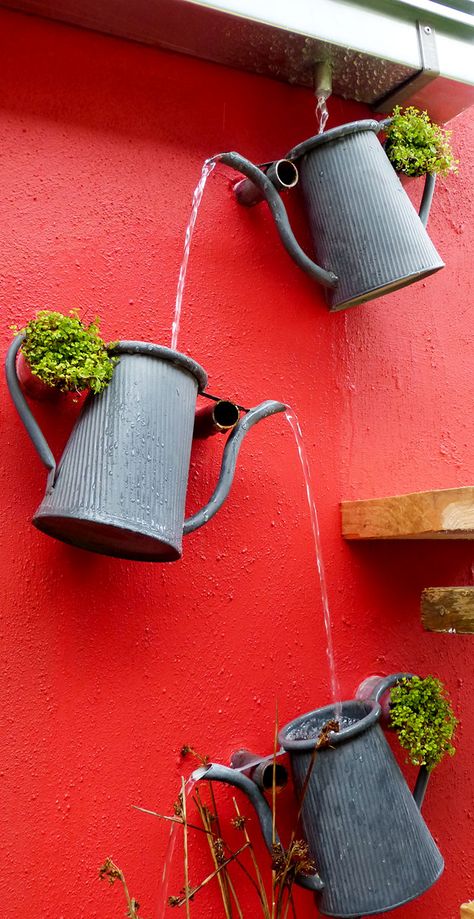 Fantastic cascading watering can feature. Great way to create a decorative drainage system from the gutter. Garden Art, Gardening, Watering Can, Garden Crafts, Garden Projects, Diy Garden, Water Garden, Garden Decor, Backyard Garden