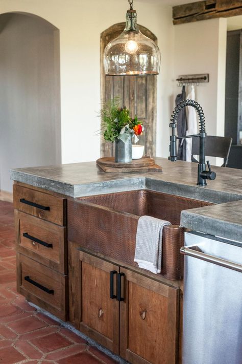 Sterling Zan is a fan of copper, so Joanna incorporated a copper farmhouse sink and brushed copper fixtures. Farmhouse Kitchen Cabinets, Kitchen Remodel Idea, Outdoor Kitchen, Concrete Kitchen, Kitchen Remodel, Copper Farmhouse Sinks, Home Kitchens, Ranch House, Kitchen Design