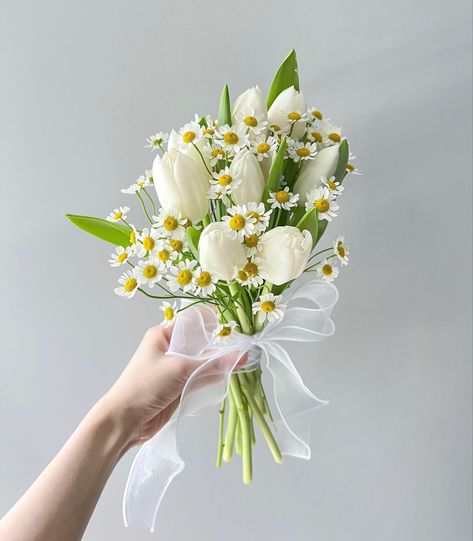 bouquet with white tulips and daisies, tied together with a tulle ribbon Bridesmaid Bouquet White, Bridesmaid Bouquet, Bridal Bouquet Flowers, Tulip Bridesmaid Bouquet, Bridal Bouquet, Wedding Bouquets Bride, Daisy Bridal Bouquet, White Wedding Bouquets, Small Bridal Bouquets