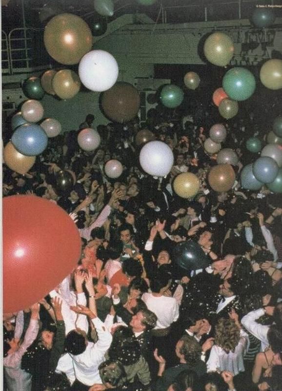 a party with balloons and confetti flying in the air above it is an advertisement for time magazine
