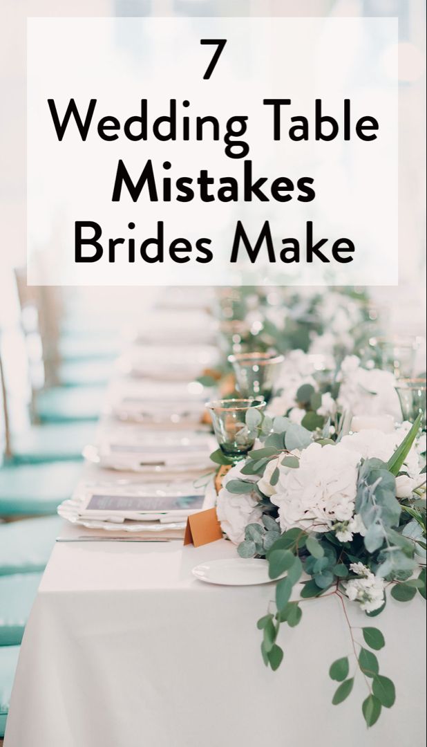 a table with white flowers and greenery on it that says 7 wedding table mistakes brides make