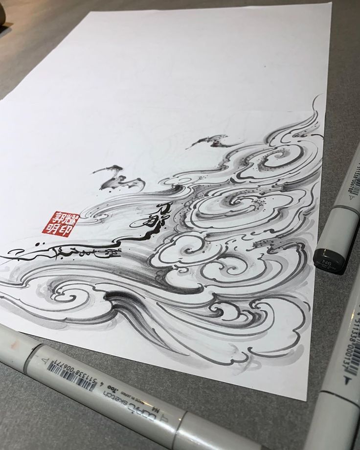 an artistic drawing on paper with markers and pencils