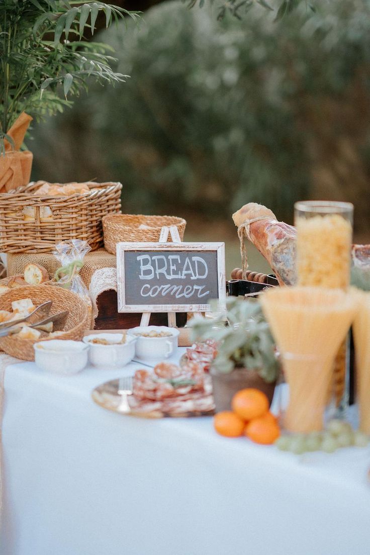an assortment of breads and pastries on a table