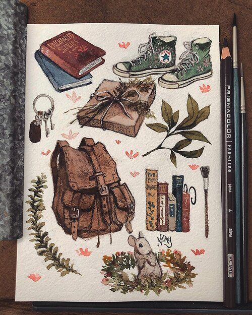 an open notebook with various items on it
