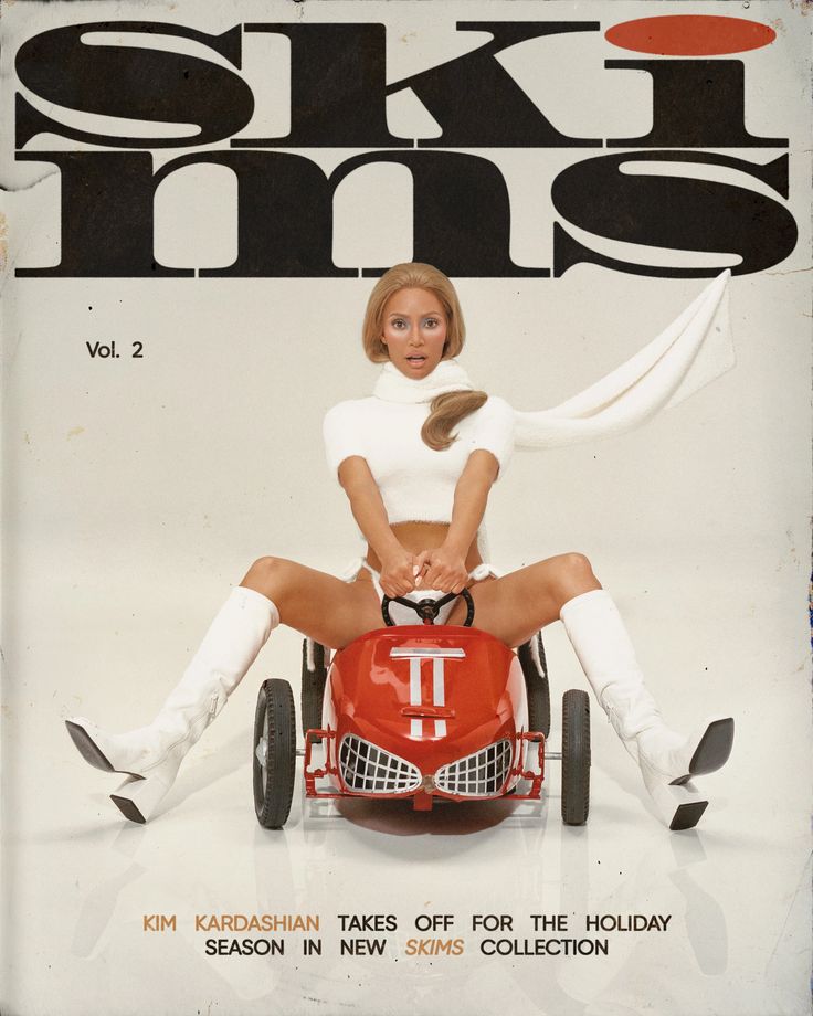 a magazine cover with a woman sitting on top of a red car and wearing white stockings