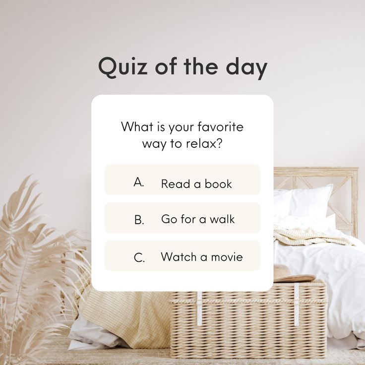 a wicker basket sitting on top of a bed next to a white wall with the words quiz of the day