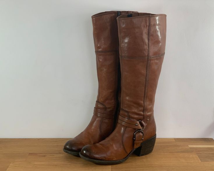 Vintage Brown Leather Boots Chunky Heel And Harness Clarks Size 38 EU / Size UK women 5 1/2 / US some 7 1/2 Size on the sole - 8- Please check detailed measurements below Measurements: Length Sole Outside: 26 cm / 10 1/4 inches Widest part of the sole outside: 9.5 cm / 3 3/4 inches Height of the boots: including the heel: 44.5 cm / 17 1/2 inches Height of the heel: 6 cm / 2 1/4 inches Circumference at the top:41 cm / 16 inches Outer: Leather Inner: Textile Sole: Man made material Used. Good Vint Chunky Heels, Vintage, Shoes, Riding Boots, Boots, Crochet, Leather Boots, Shoe Boots, Brown Leather Boots