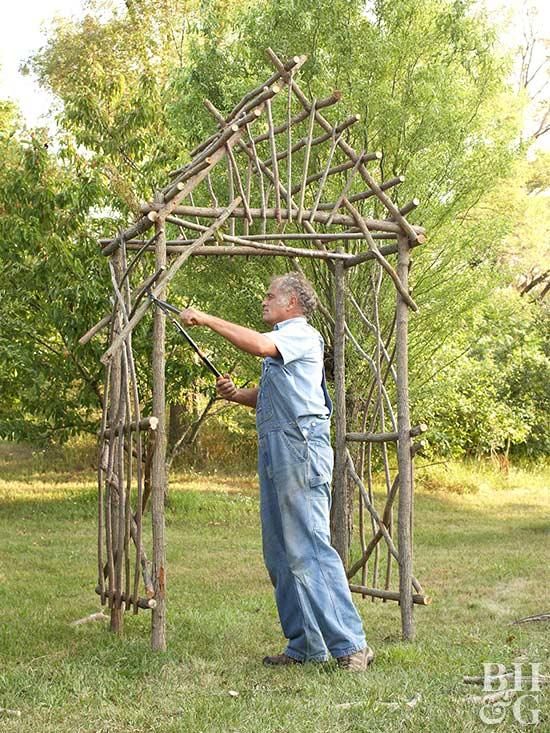 an old man is building a wooden arbor in the yard with text that reads, create your own arbor trellis using materials just lying around