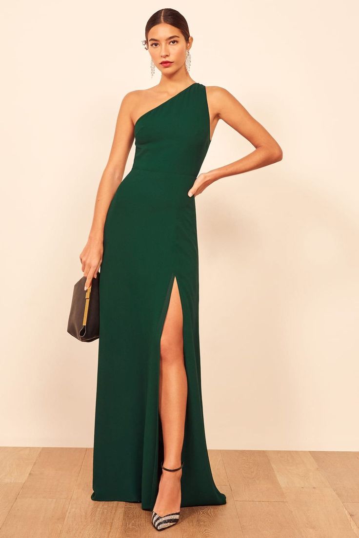 Showcase your shoulders and shape in this body-skimming gown in rich emerald green from Reformation. Complete your look with shoulder-grazing earrings, statement pumps, and classic red lips for the perfect wedding guest outfit at a modern fall wedding. Click to find more wedding guest dresses just like this one! // Photo: Reformation Bodice, Dresses, People, Reformation Dress, Strapless, Strapless Bra, Dress, Reformation, One Shoulder