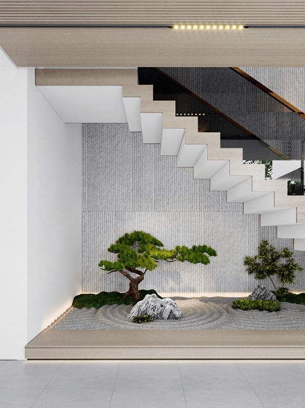 a bonsai tree in the middle of a room with stairs leading up to it
