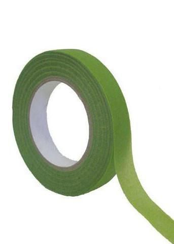 a roll of green tape on a white background