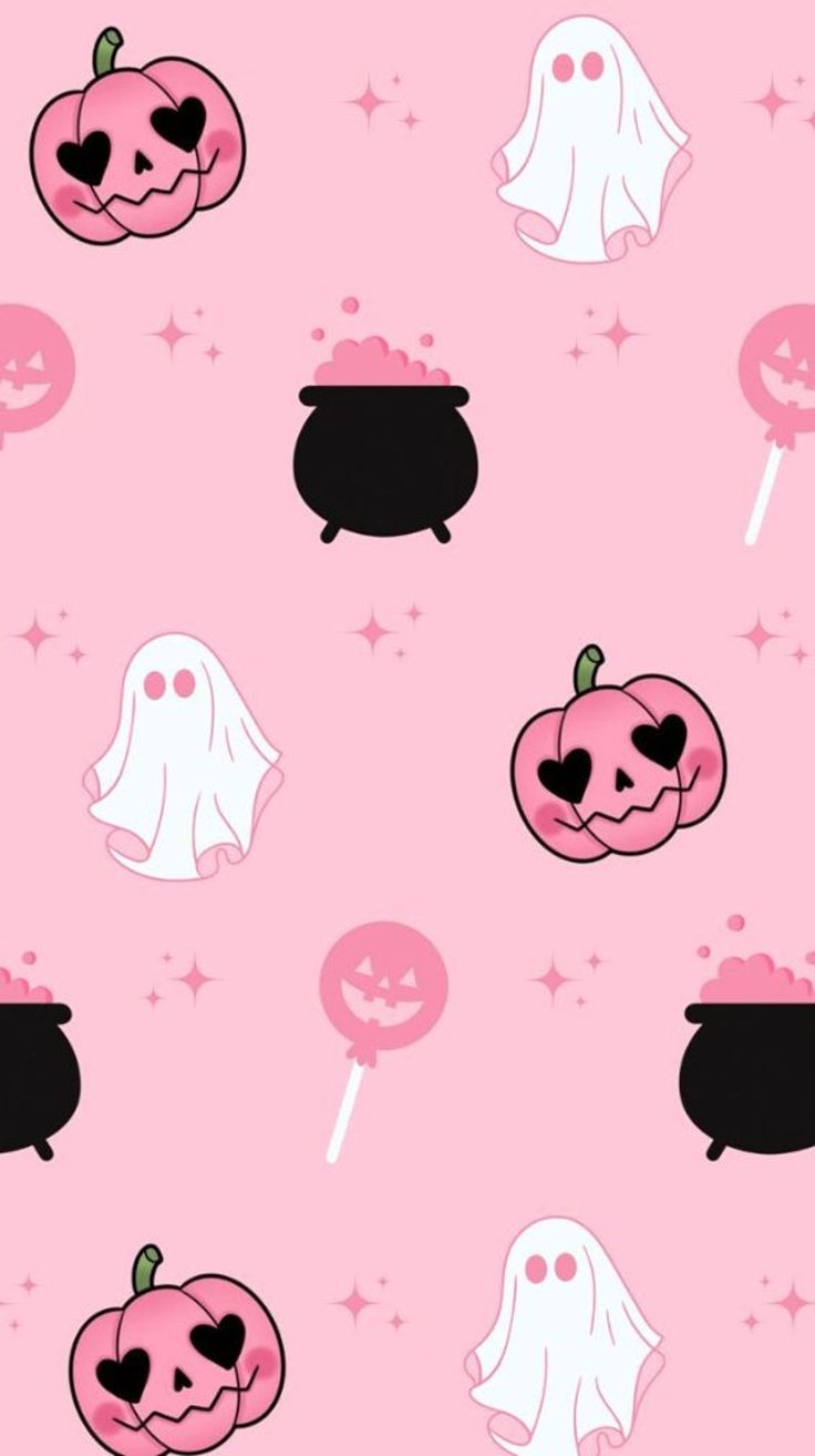 a pink background with halloween themed items on it
