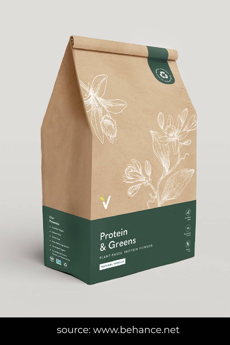 a brown paper bag with white flowers on it and the words protein & greens printed on it