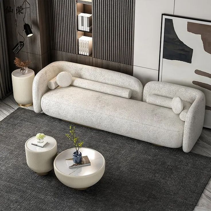 a modern living room with two white couches
