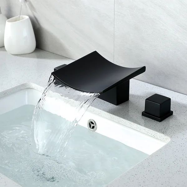 a black faucet with water running from it