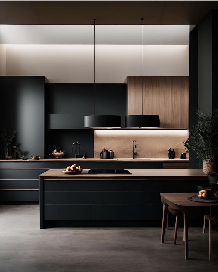 a modern kitchen with black cabinets and counter tops is seen in this image from the front view