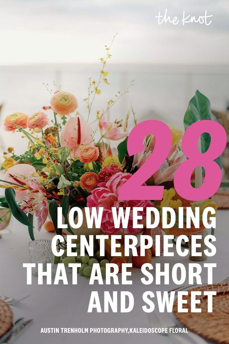 a table with flowers on it and the words 28 low wedding centerpieces that are short and sweet
