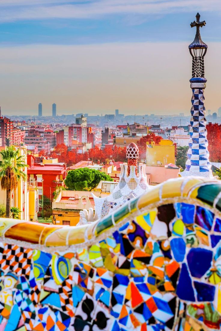 the city skyline is shown with colorful tiles on it