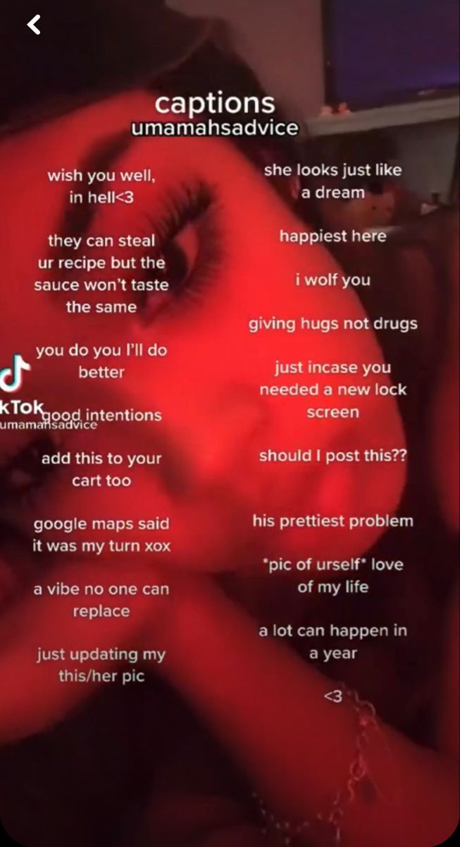 a woman with red makeup and words on her face