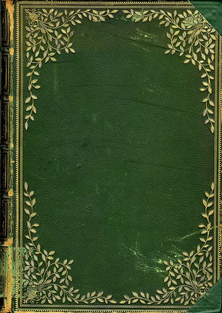 an old green book with gold trimming
