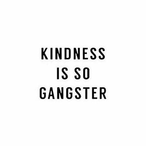 a black and white photo with the words kindness is so gangster written in bold font