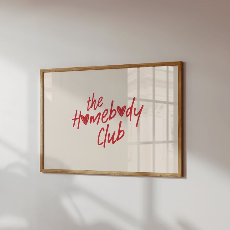 there is a sign on the wall that says the homeboy club in red ink