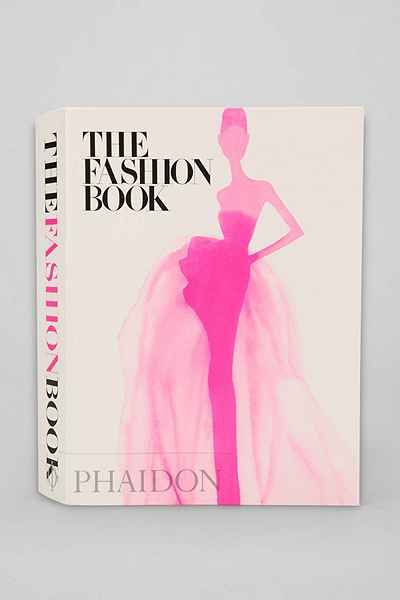 the fashion book is pink and white with a woman in a dress on it's cover