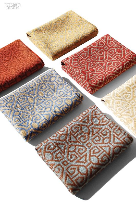 four different colors of fabric on a white background, each with an intricate design in the middle