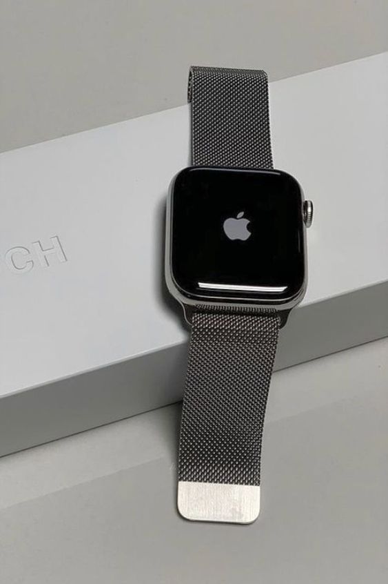 an apple watch sitting on top of a box
