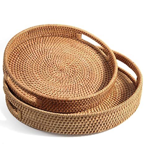 two round baskets sitting on top of each other