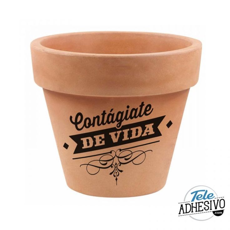 a clay pot with the words contagitate de vida on it's side