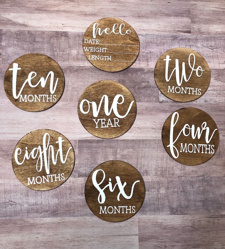 six wooden coasters with the words ten, one year and six months printed on them