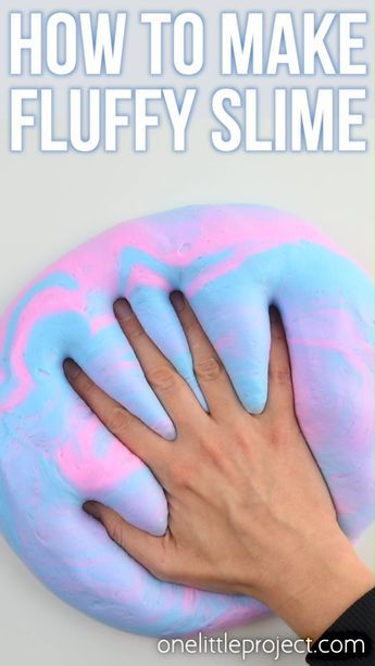 a hand touching a blue and pink doughnut with the words how to make fluffy slime on it