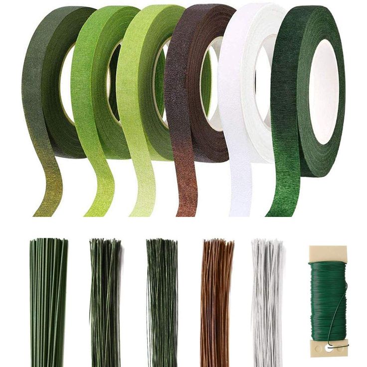 various colors of tape and spools for making decorative wall hangings, including green