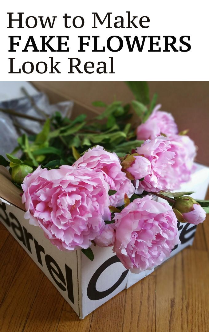pink flowers in a box with the words how to make fake flowers look real
