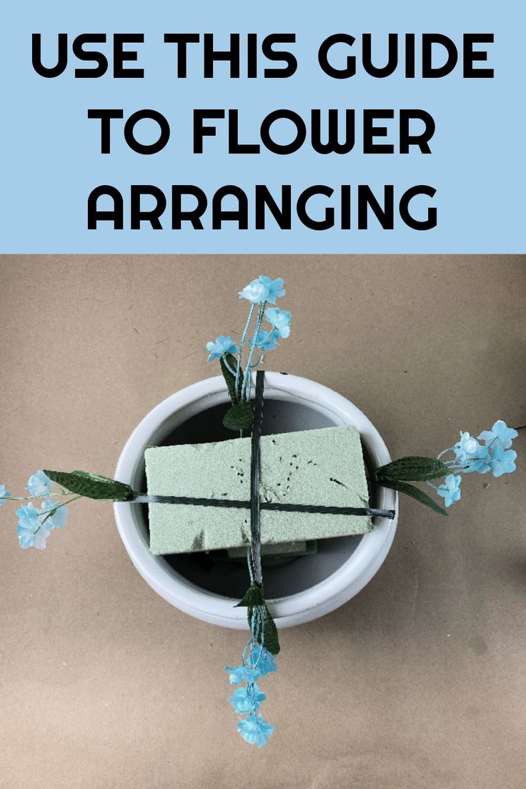 a flower arrangement with text overlay that reads, use this guide to flower arranging