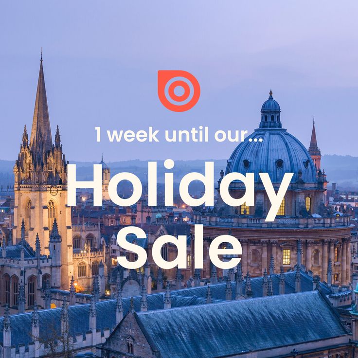 the words holiday sale are overlaided with an image of buildings and spires