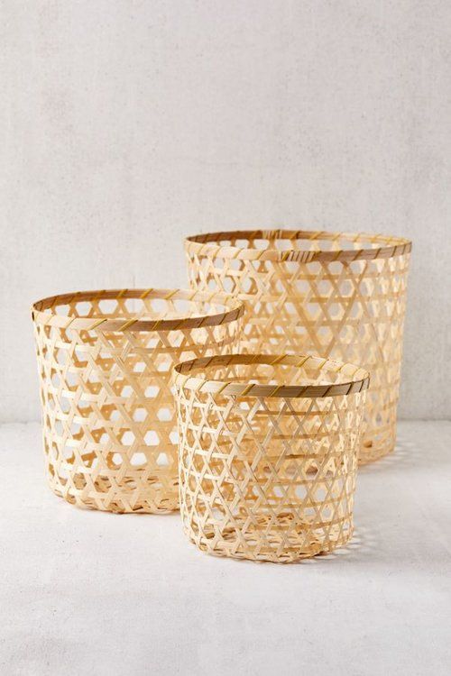 three woven baskets sitting on top of each other