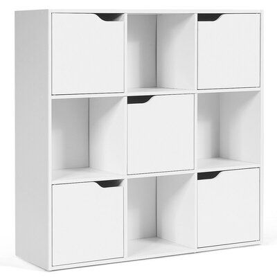 a white bookcase with six cubes on top