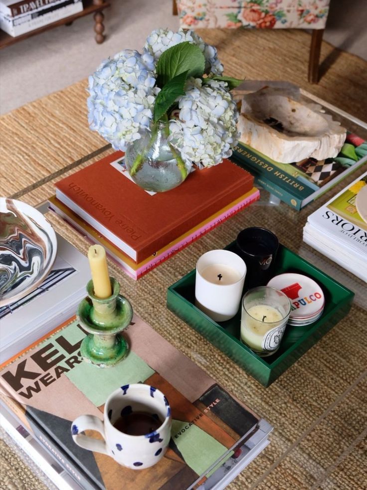 Coffee table decor including coffee table books, candles, candle holders, trays and dishes Interiors, Home Interior Design, Interior, Home Décor, Eclectic Interior Style, Living Decor, Home Decor, Interior Design Books, Eclectic Coffee Tables
