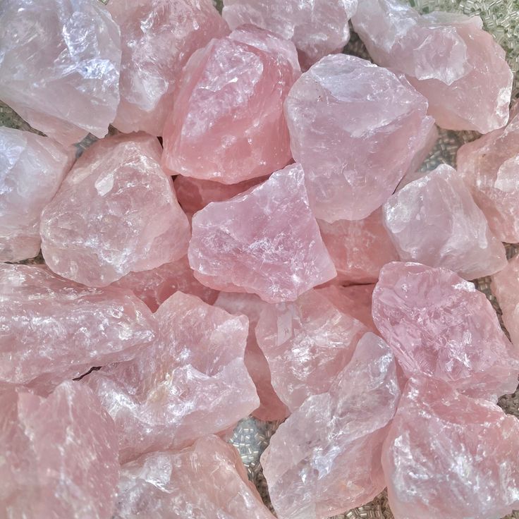 pink crystals are piled on top of each other