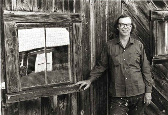 Paul Metcalf outside his writing cabin in the early 1970s.